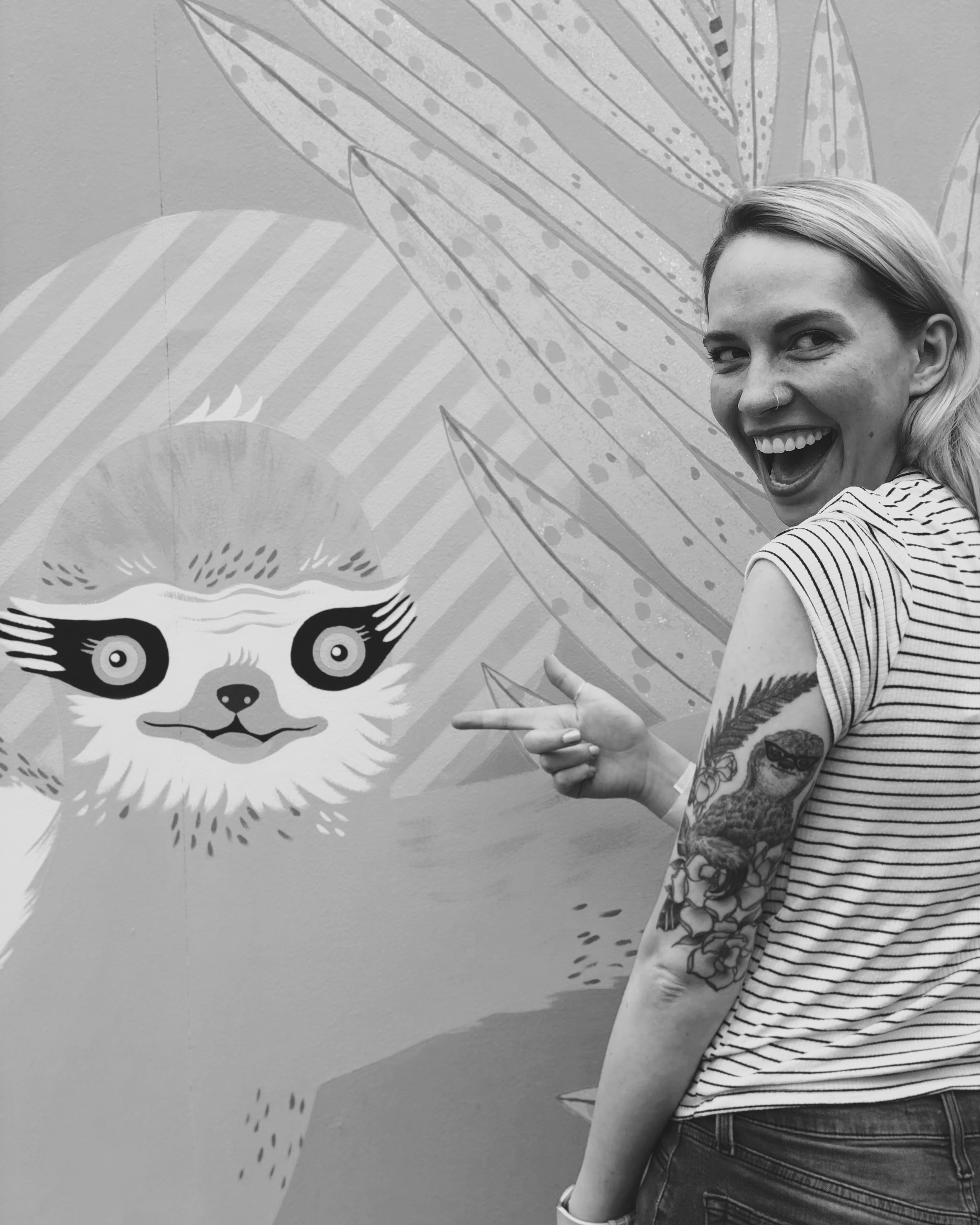 Picture of Emily with sloth tattoo